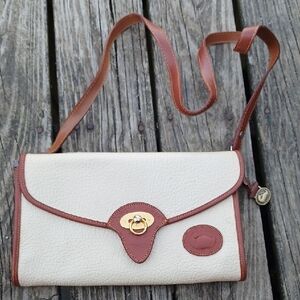 Dooney & Bourke Cream and Brown Leather Crossbody Clutch.